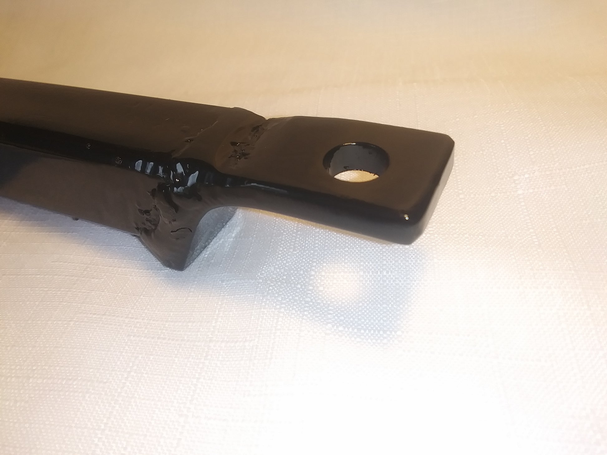Headlight mount tab